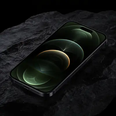 Phone glowing on dark stone